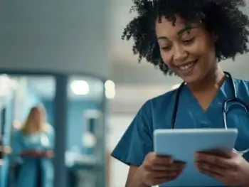 Nurse practitioner reviewing notes